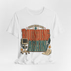 "Guess Who's Back: Rounding Again" — Funny Rounding Nurse T-Shirt
