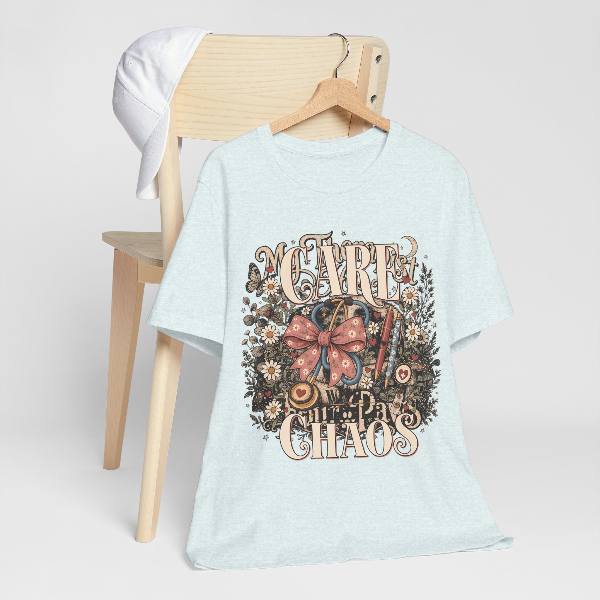 "Care With A Little Chaos" Coquette Nurse T-Shirt — Cute Nurse Graphic Tee