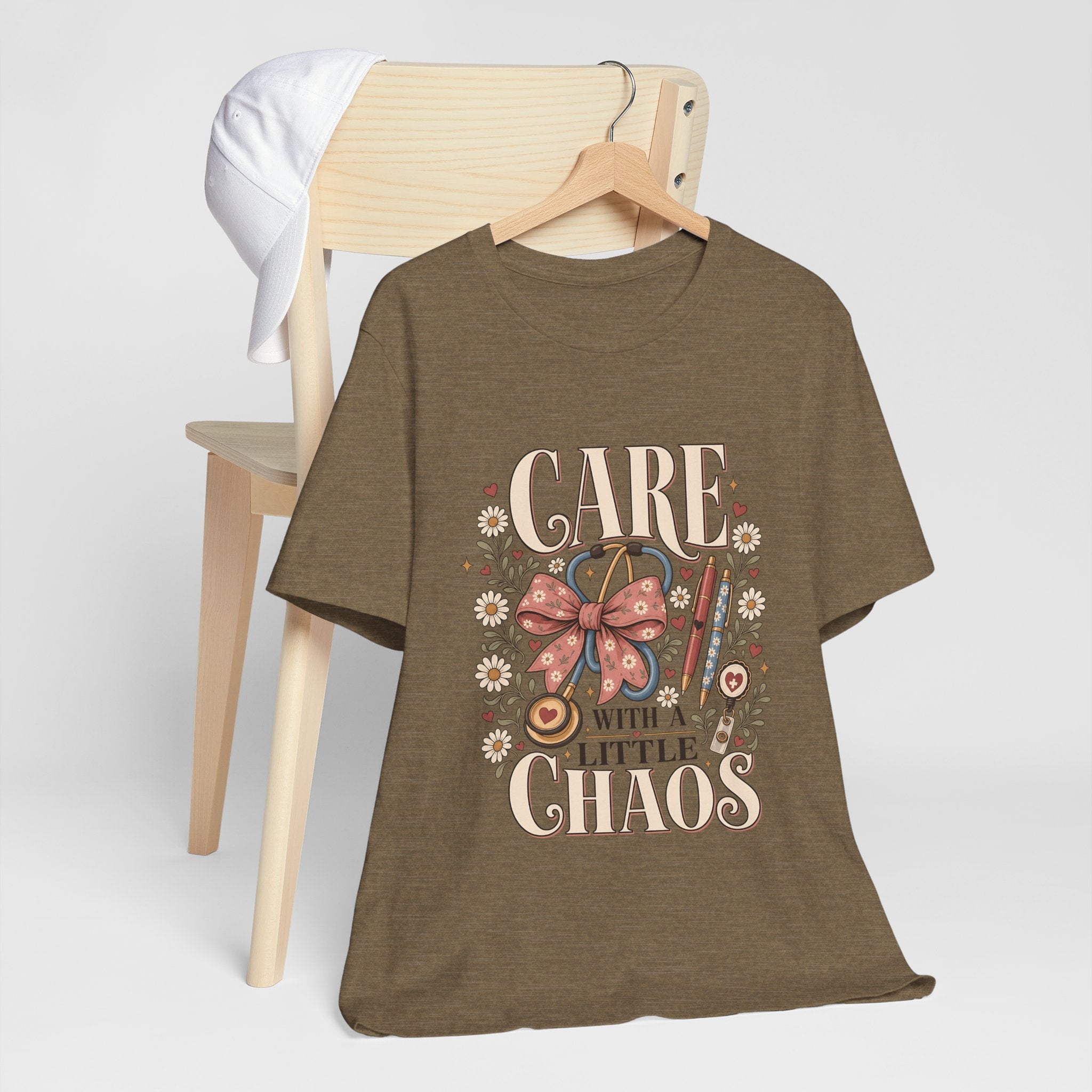 "Care With A Little Chaos" Coquette Nurse T-Shirt — Cute Nurse Graphic Tee
