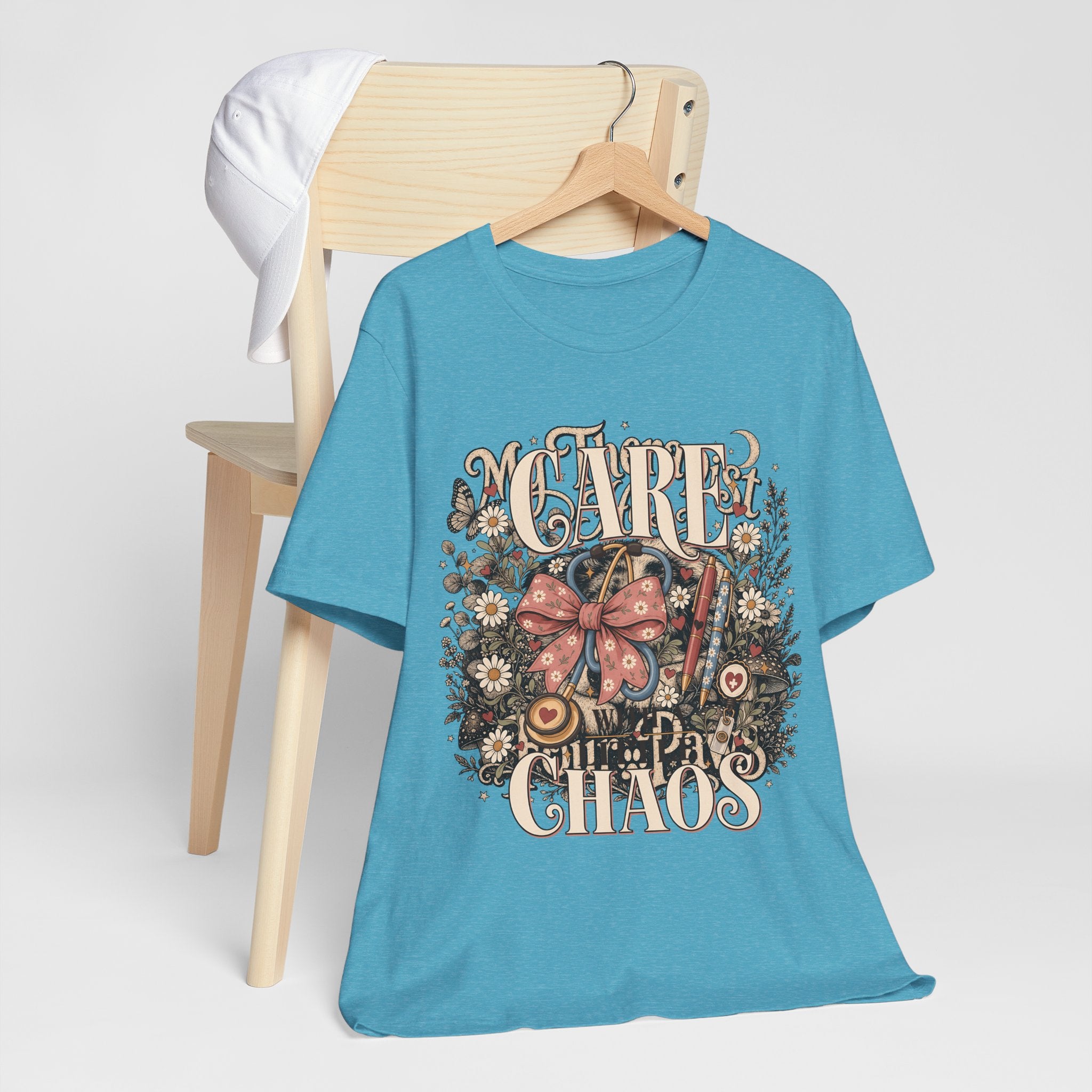 "Care With A Little Chaos" Coquette Nurse T-Shirt — Cute Nurse Graphic Tee